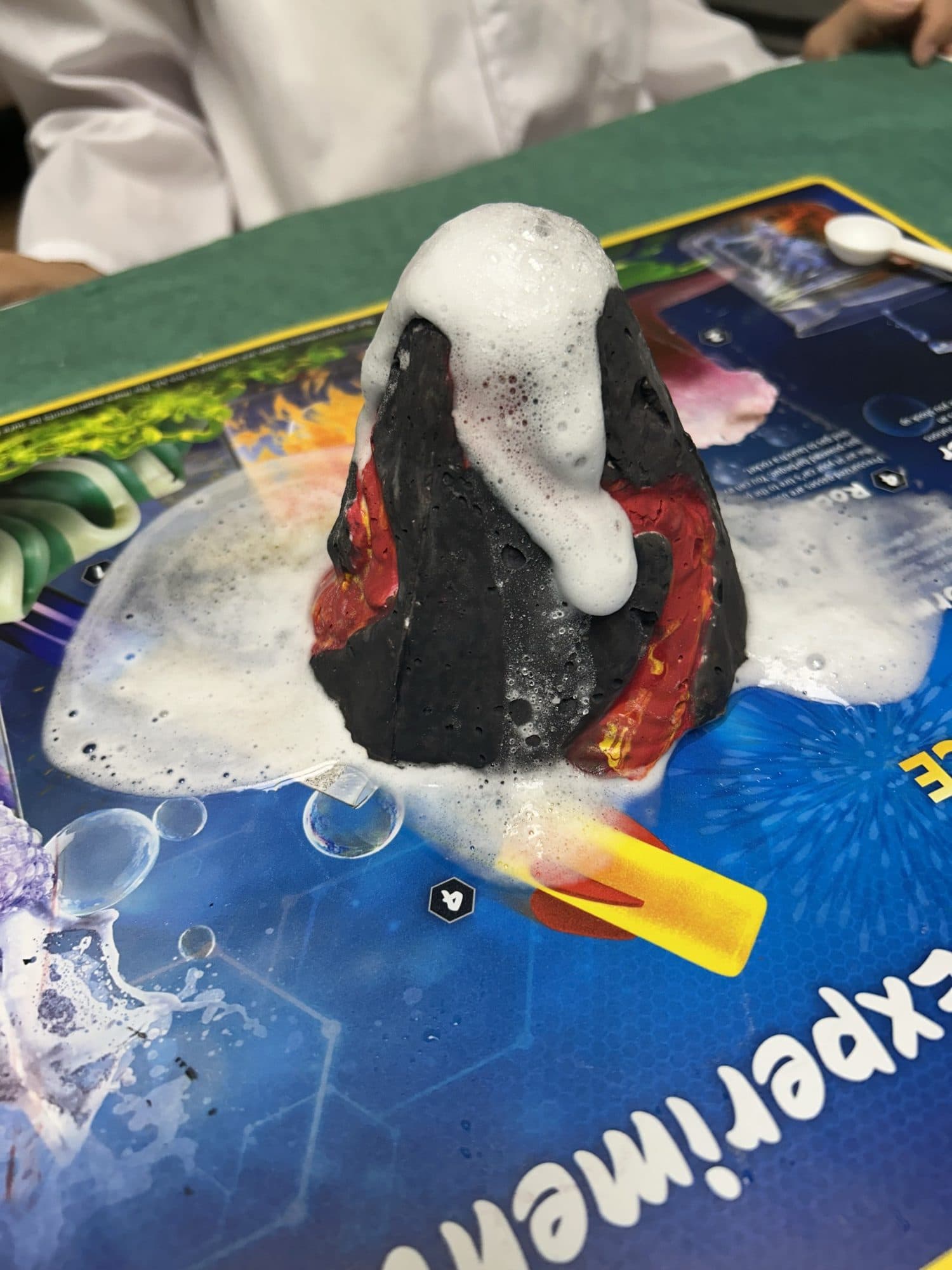 My volcano covered in white bubbly foam